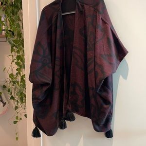 Purple poncho jacket w/ black details and poms